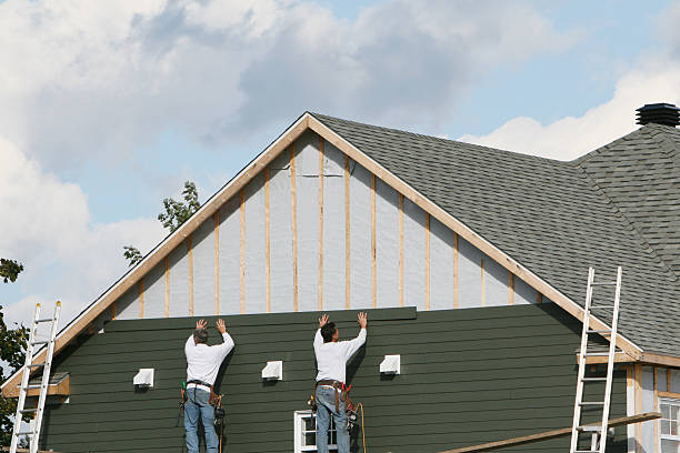 Professional Siding technician working in Asbury Park, NJ